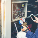 Technician is checking air con